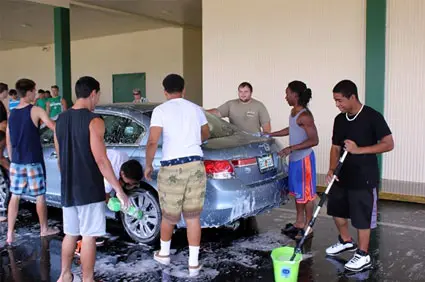 Run a Team Car Wash for swim team fundraising